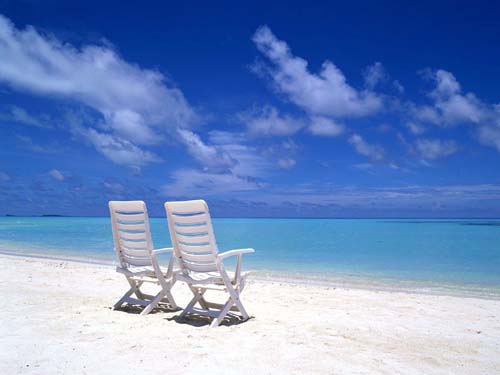 Foto Strand mit St�hlen